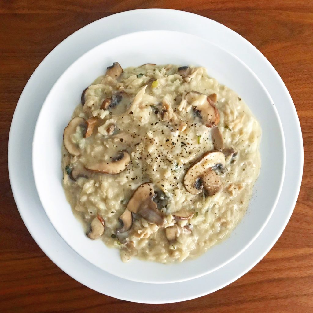 Risotto with homemade rabbit and chicken stock shredded bone in chicken thigh meat cremini mushrooms and local burrata recipe homemade cooking Italian comfort food dinner cheese