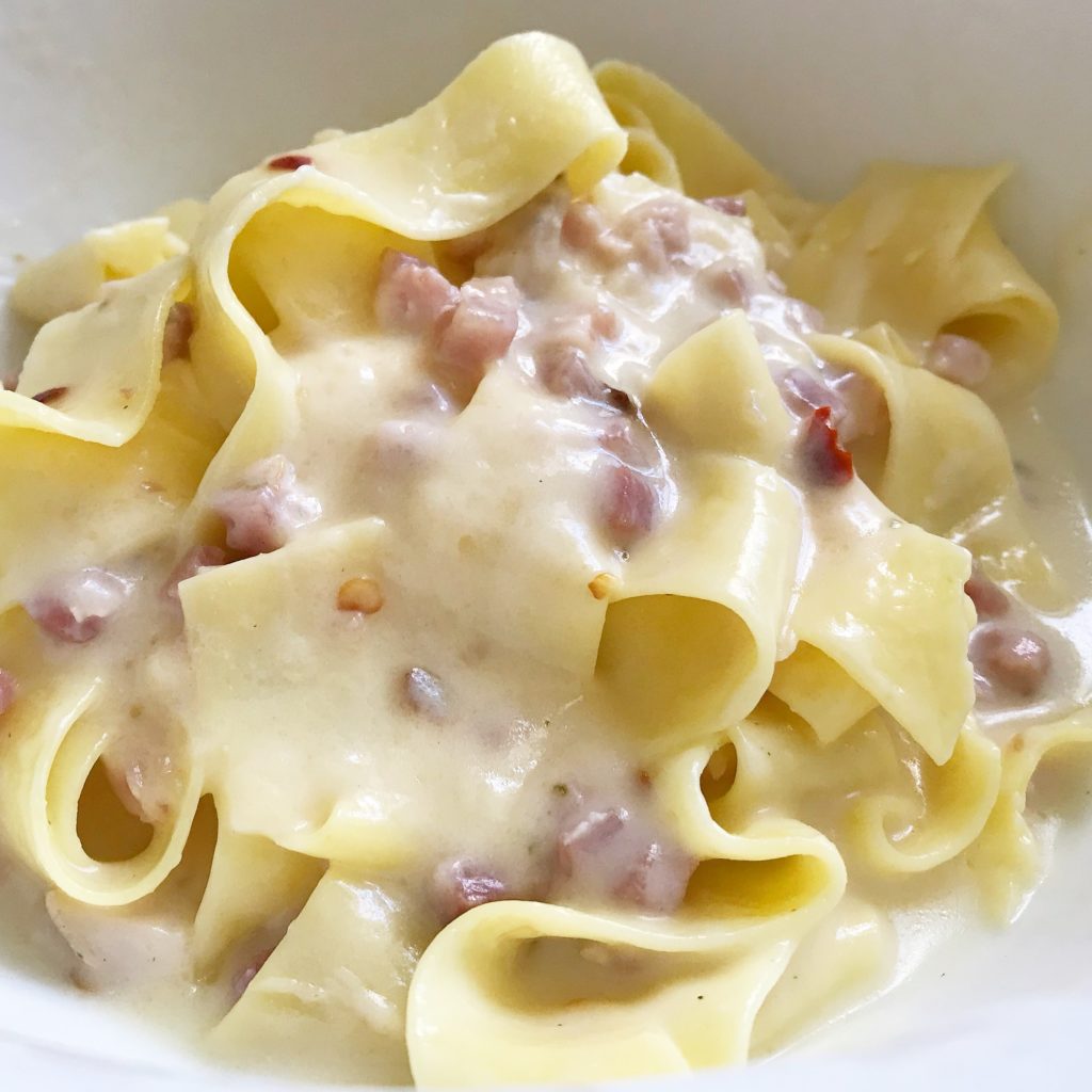 Homemade pappardelle pasta with Piemontese sodium citrate cheese sauce pancetta chile chili flakes fresh rosemary creamy easy dinner comfort food recipe